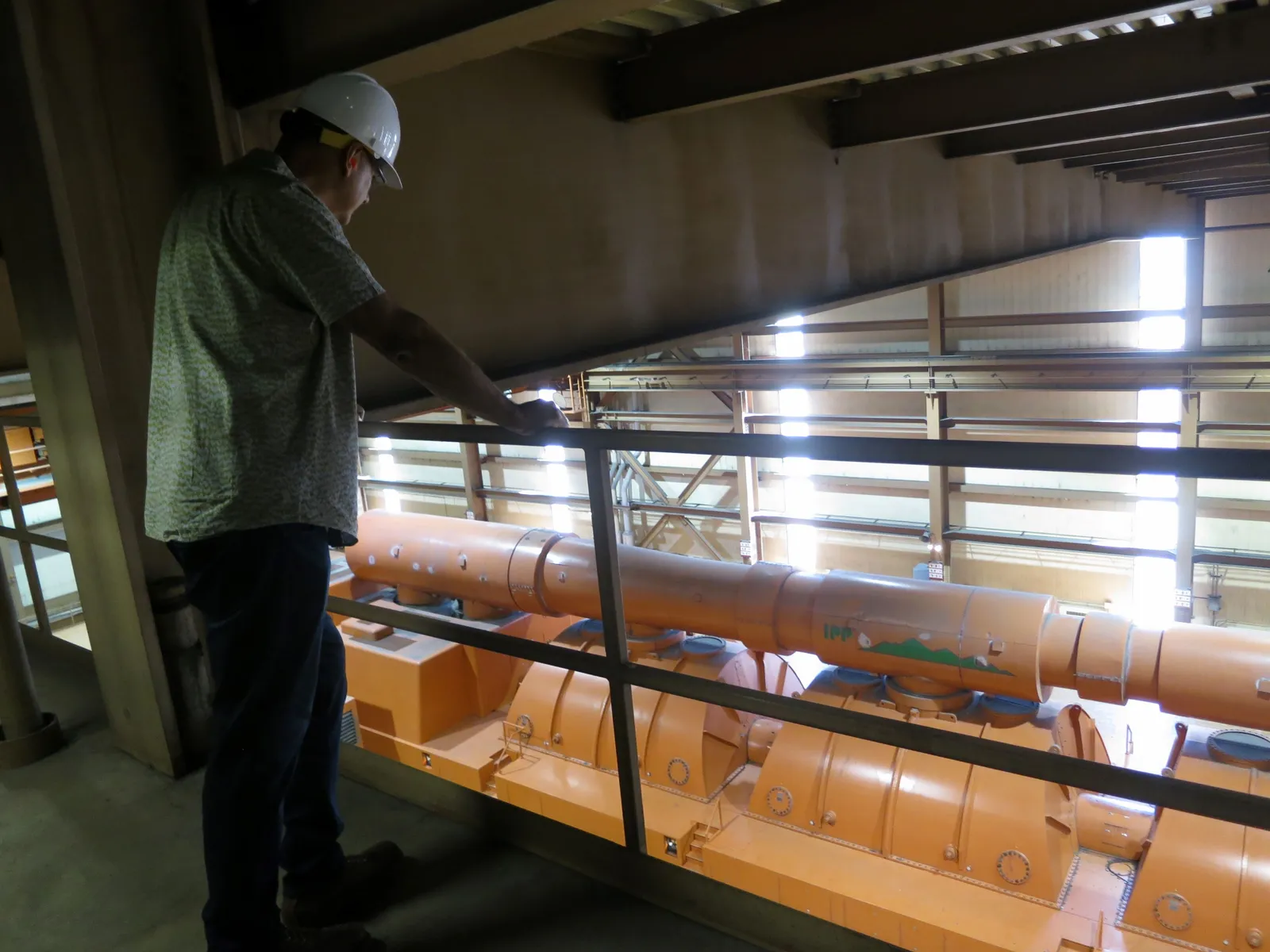 Intermountain Power Project spokesman John Ward looks over the plant’s existing General Electric turbines.