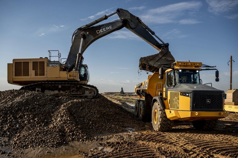 A self-driving dump truck being loaded.