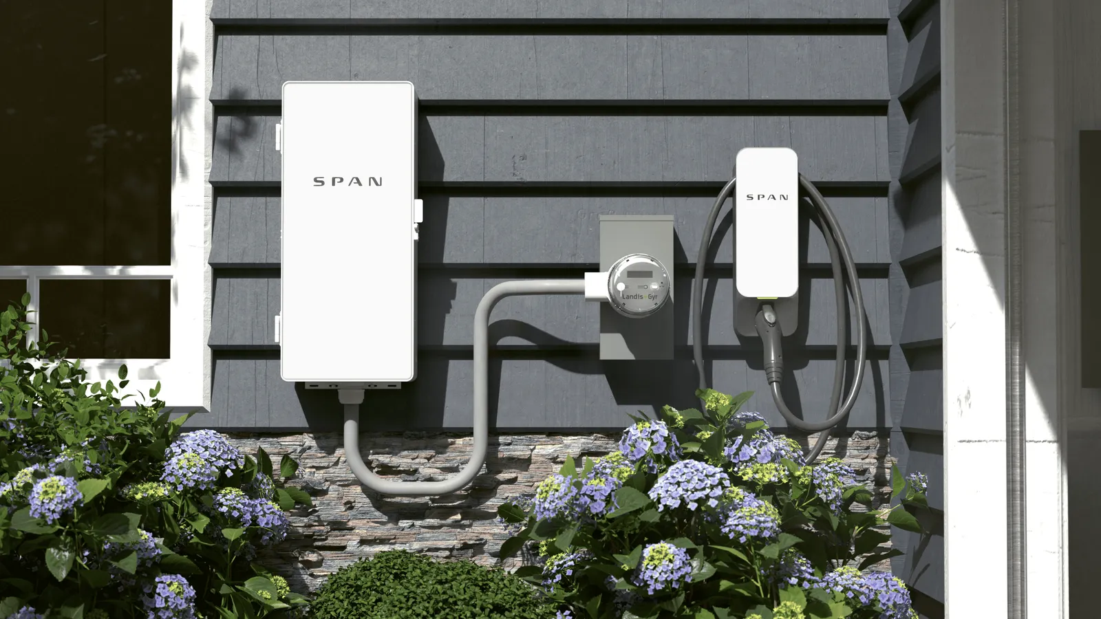 A SPAN Edge device attached to an electricity meter on the side of a house.