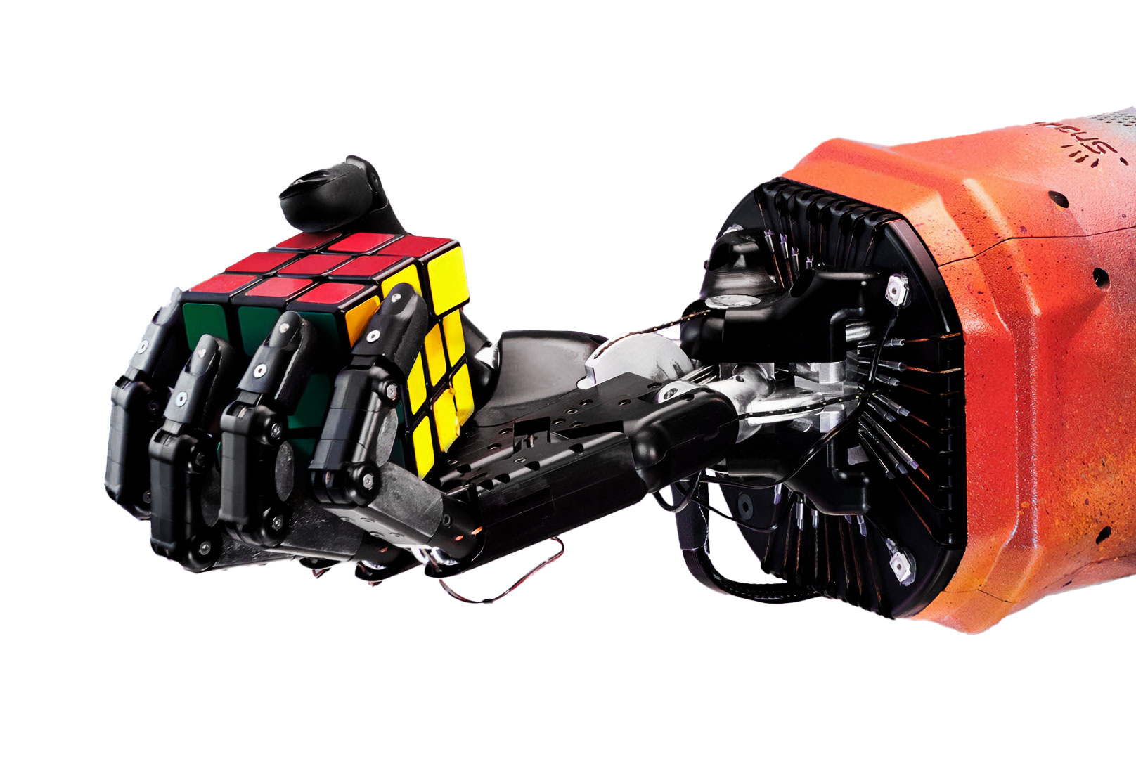 a Dactyl robot hand holds a Rubix cube