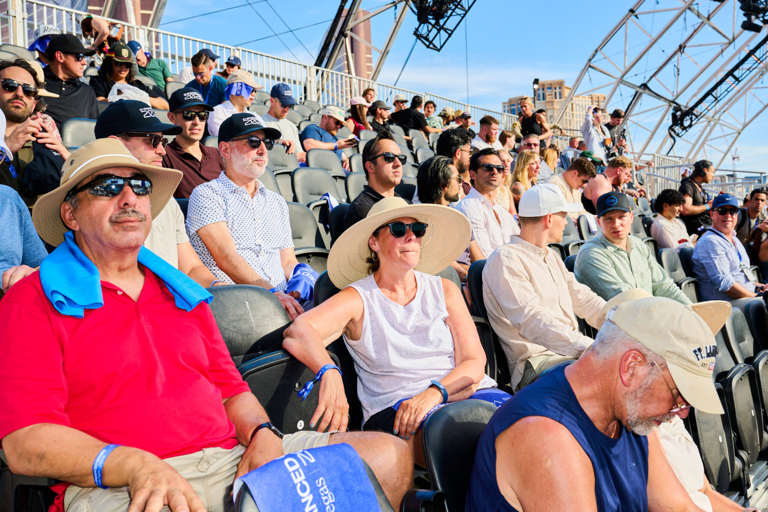 attendees sitting in the bleachers