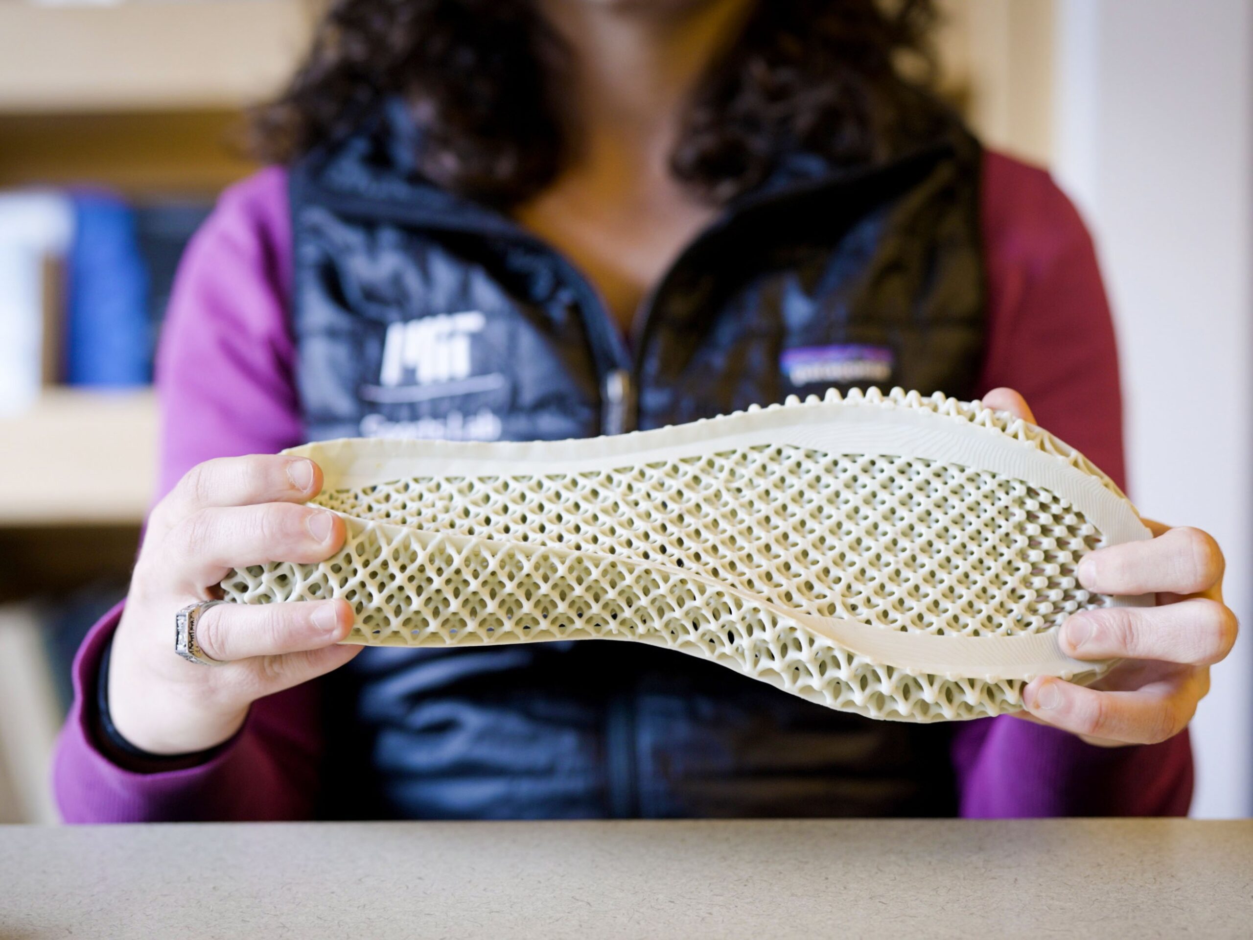 person holding a shoe sole